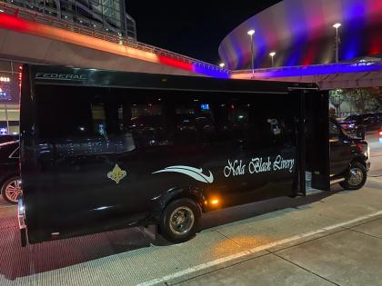BLACK 24 PASSENGER EXECUTIVE BUS 